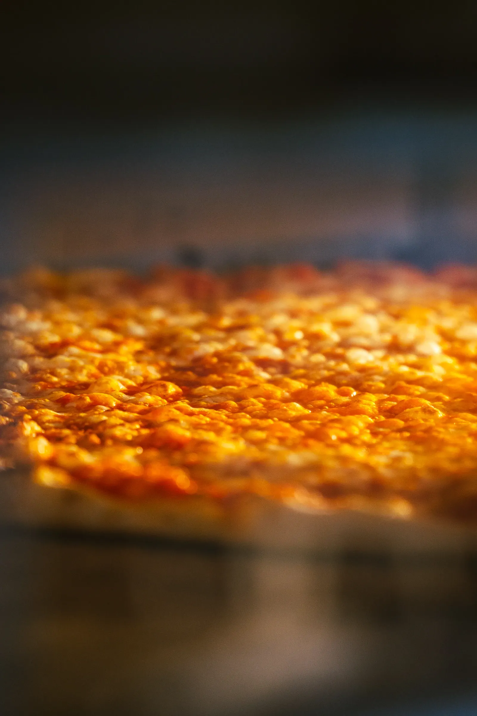 Whole pizza on a tray ready to slice at Frankie's Cork