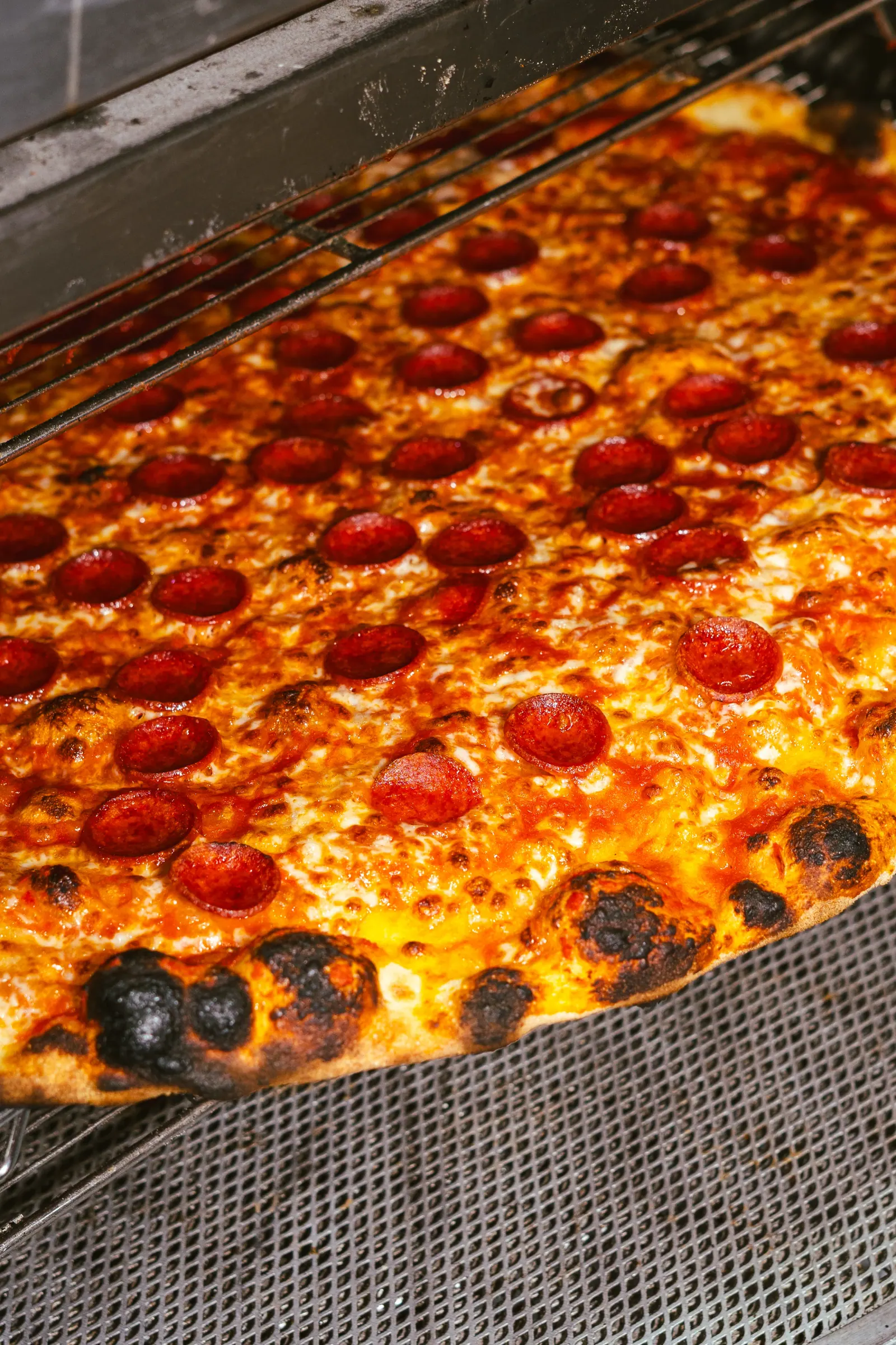 Close-up of toppings on a Frankie's pizza